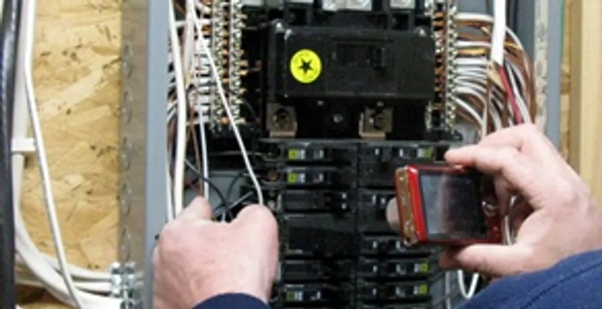Home electrical inspection of circuit breaker panel by licensed electrician in Lakeland, FL