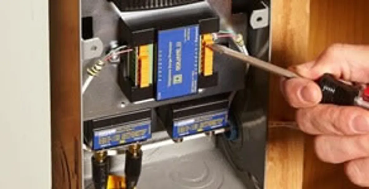 Whole home surge protection device being installed by a licensed electrician to protect electrical systems in Lakeland, FL
